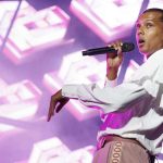 Stromae riceve onore dal re filippo: un simbolo di orgoglio belga